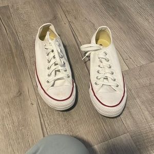 woman’s white converse